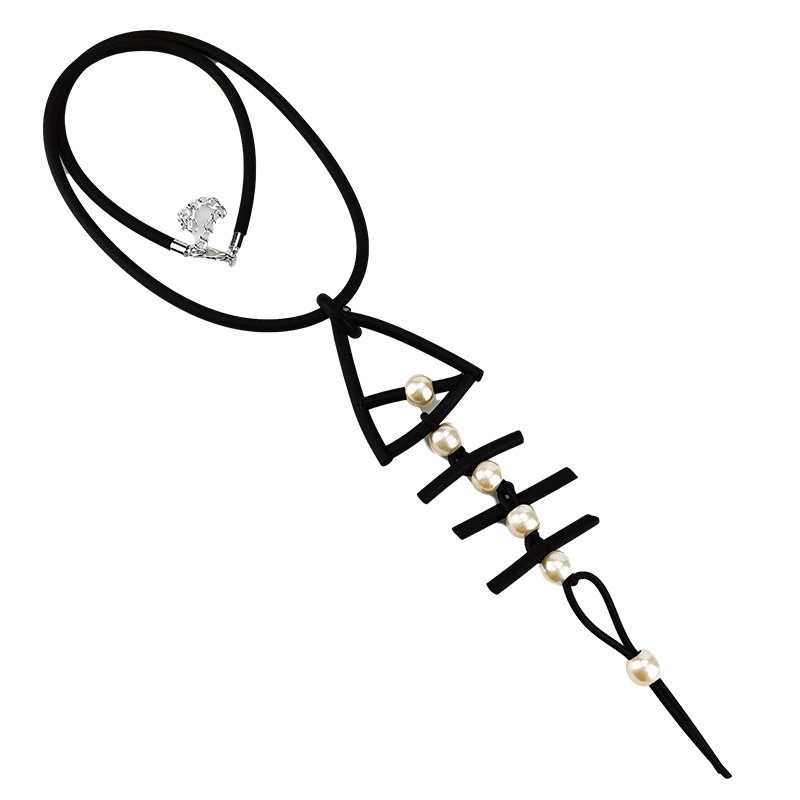Gothic women's long necklace featuring a rubber fish bone pendant with pearls, perfect for stylish outfits.