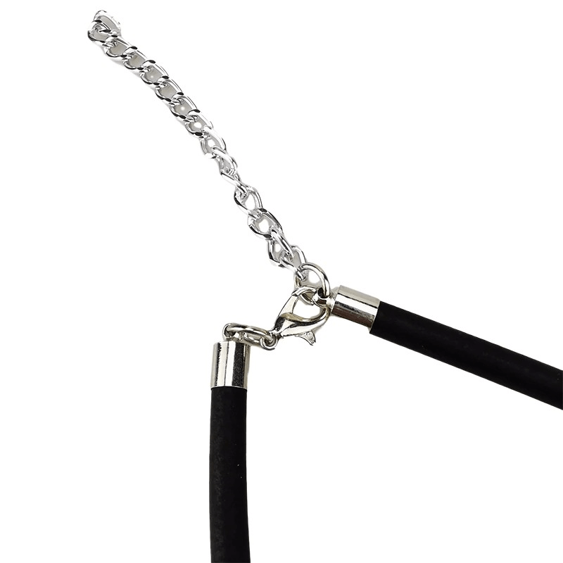 Close-up of the clasp detail on a rubber fish bone pendant necklace, showcasing gothic style and a silver chain.