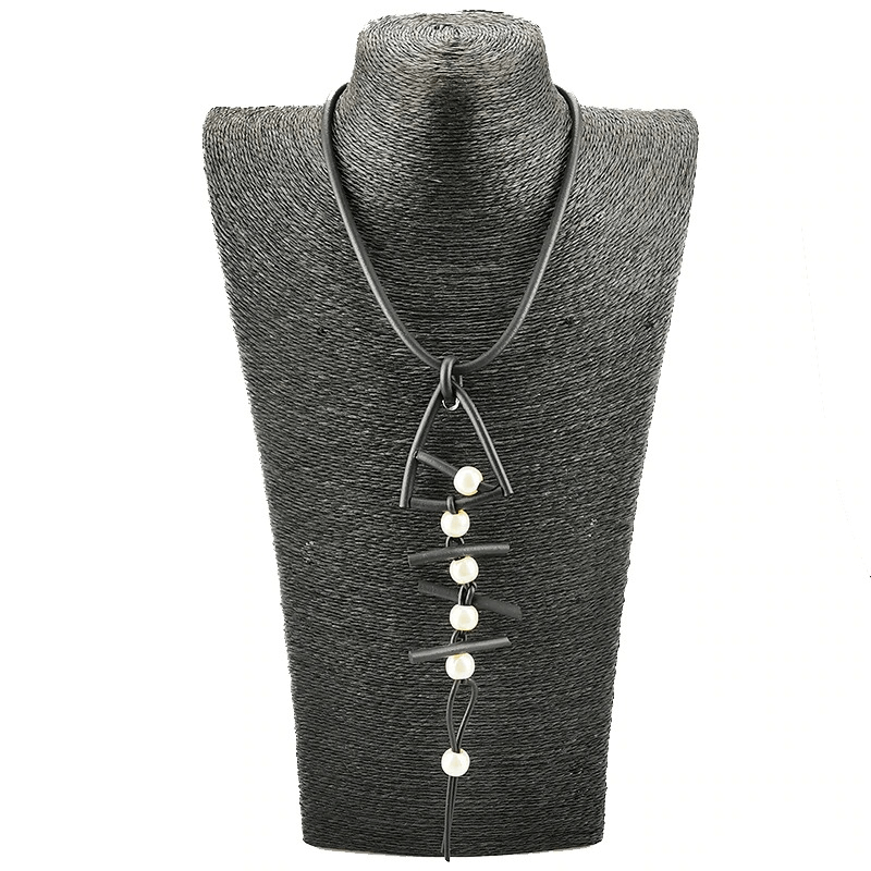 Handmade Gothic Fish Bone Pendant Necklace on mannequin, featuring rubber design and stylish pearl accents.