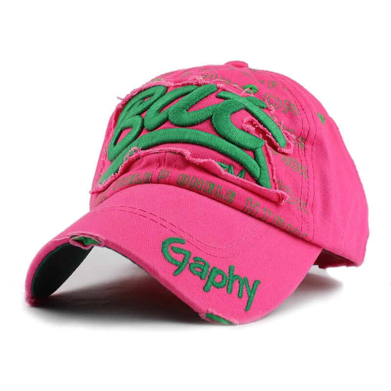 Fitted unisex pink baseball cap with green inscription, perfect casual fashion accessory for any occasion.