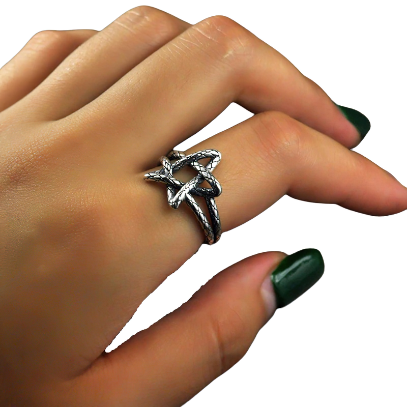 Close-up of a woman's hand wearing a five-star open retro ring in 925 sterling silver, showcasing its unique design.