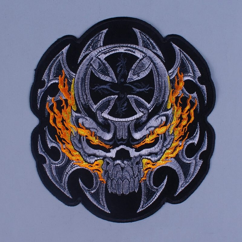 Large embroidered biker patch featuring a flaming skull design, perfect for jackets and stylish outfits.