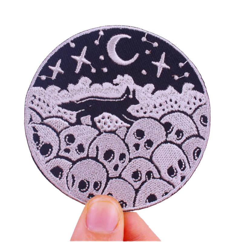 Stylish fox on skulls patch, perfect rock accessory for clothing, featuring moon and stars design.