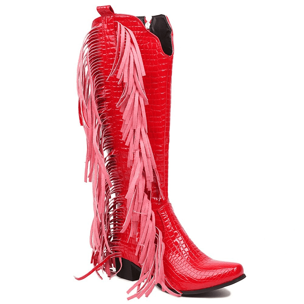 Red crocodile print vintage knee-high boots with pink tassels, perfect for alternative fashion styles.