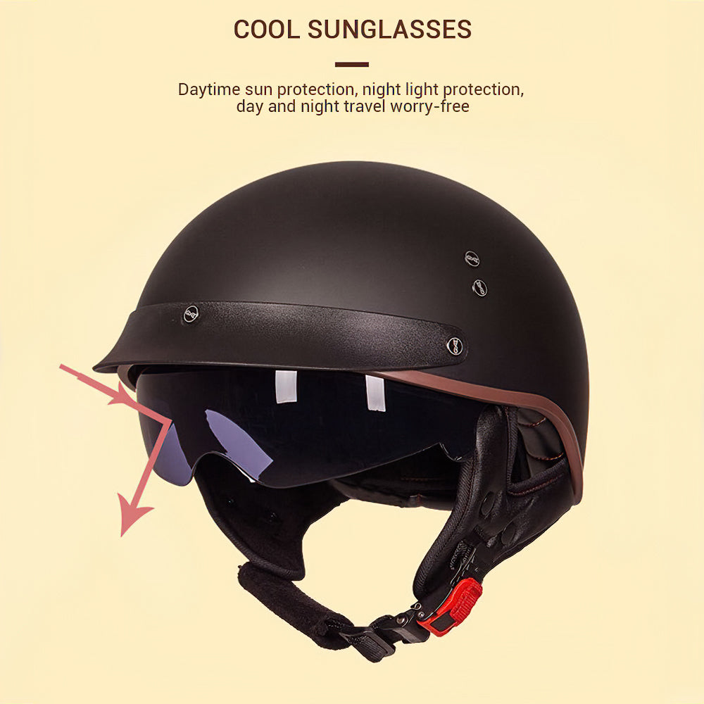 Retro black biker helmet with sunglasses, offering day and night protection for stylish rides.