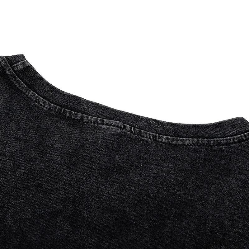 Close-up of the neckline of a black gothic tank top for men, showcasing stylish stitched details.