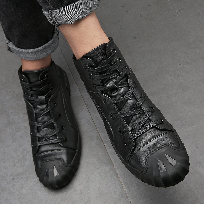 Men's genuine leather sneakers with lace-up closure and rubber outsole for casual and alternative fashion.
