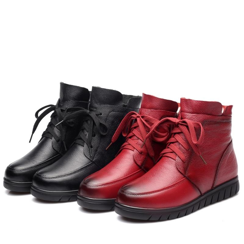 Stylish women's genuine leather ankle boots in black and red, perfect for casual winter wear.