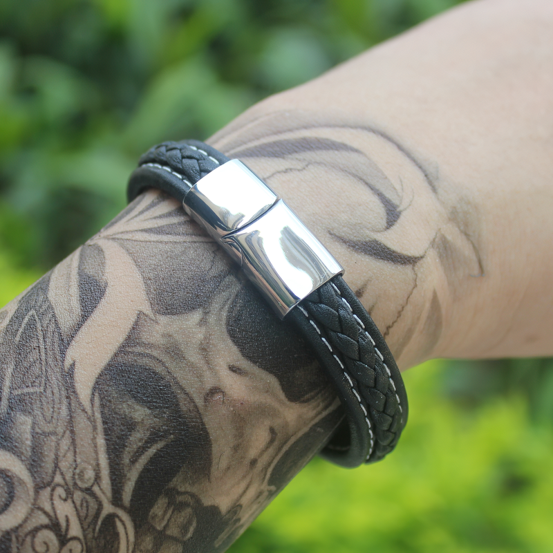 Genuine leather bracelet for men with stainless steel clasp, perfect for gothic style outfits.