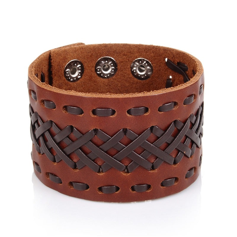 Genuine leather Viking style bracelet, handmade wide cuff accessory for men and women with woven design.