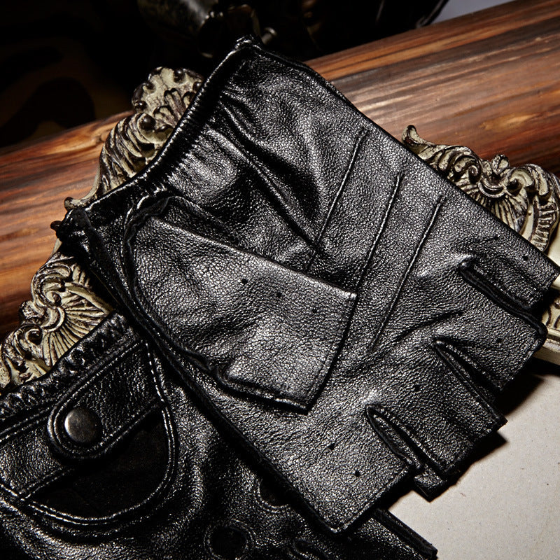 Genuine leather half finger gloves in black, showcasing breathable design with buttons and cutouts for a stylish driving accessory.