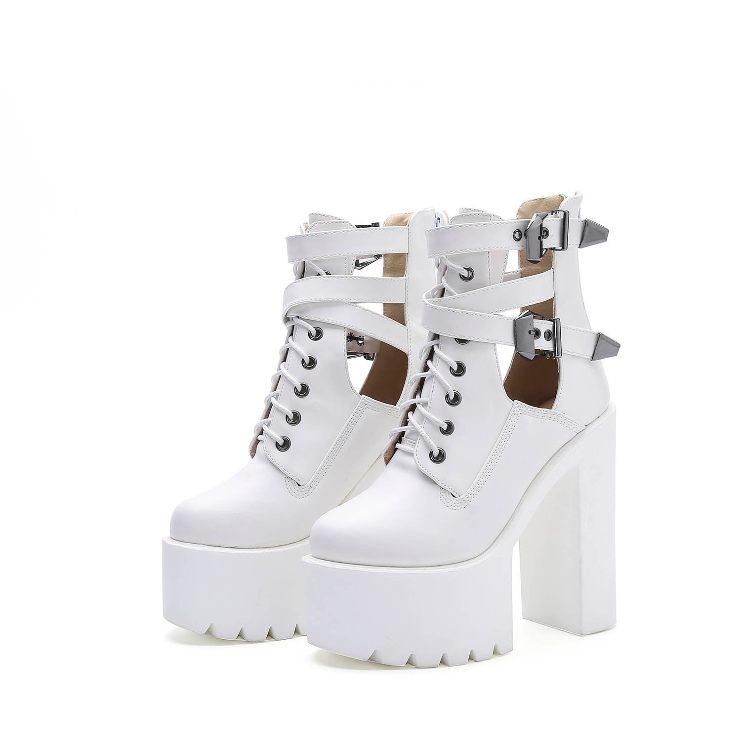 Stylish white platform ankle boots with thick heel, laces, and metal buckles for rocker outfits.