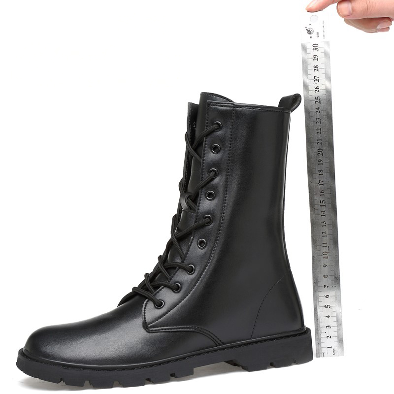 Genuine leather lace-up high top boot next to a ruler for size measurement, ideal winter footwear for men.
