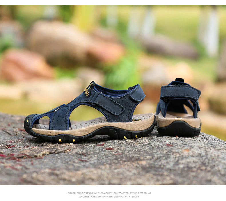 Stylish men's leather sandals in navy blue, perfect for outdoor summer adventures and casual outings.