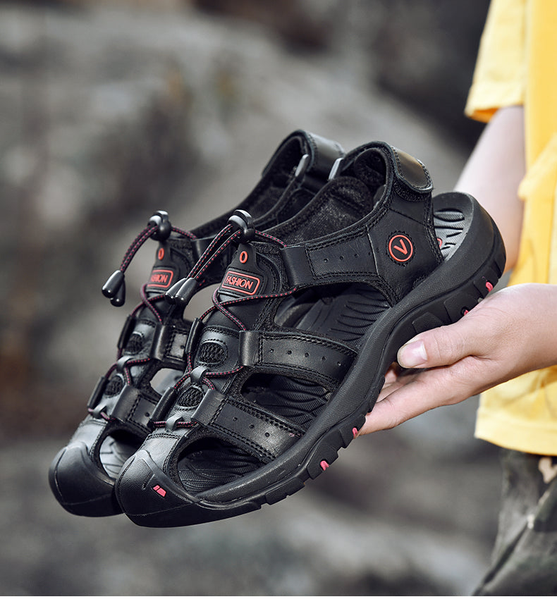 Male genuine leather sandals in black with buckle and strap design, perfect for summer beach outings.