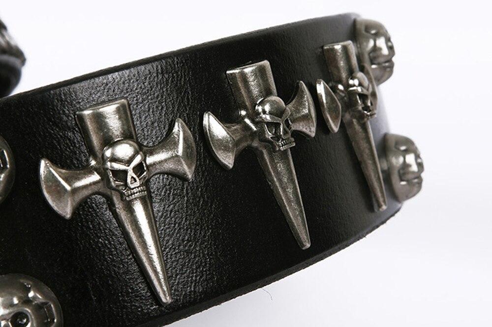 Genuine leather belt featuring skull and cross designs, perfect for a punk rock style look.