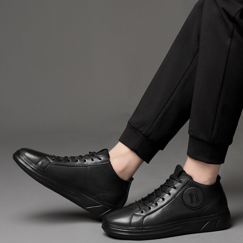 Genuine leather mid-top men sneakers in black, perfect for alternative fashion and rave outfits.