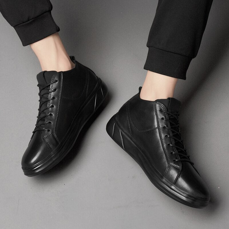 Stylish genuine leather mid-top black sneakers for men, perfect for alternative fashion and rave outfits.
