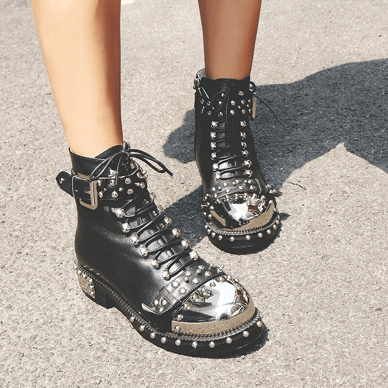 Black leather punk rock boots with rivets and metallic toe, perfect for stylish women seeking edgy ankle shoes.