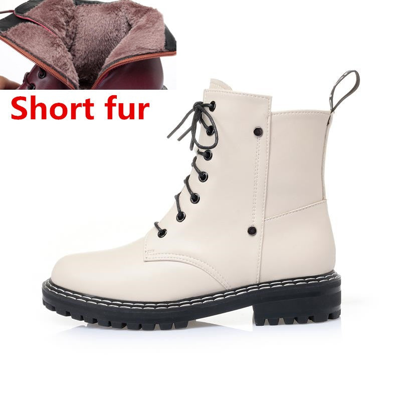 Genuine leather snow ankle boots for women with short fur lining for warmth and comfort.