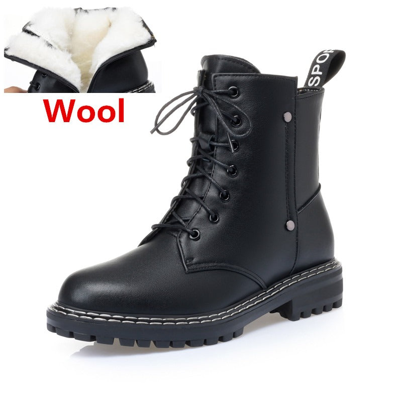 Genuine leather black ankle boots with warm wool lining, perfect for winter wear and casual styling.