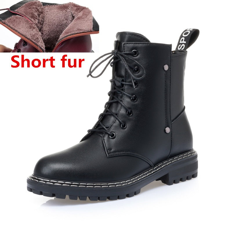 Genuine leather black ankle boots with short fur lining for warmth and style, featuring chunky sole and lace-up design.