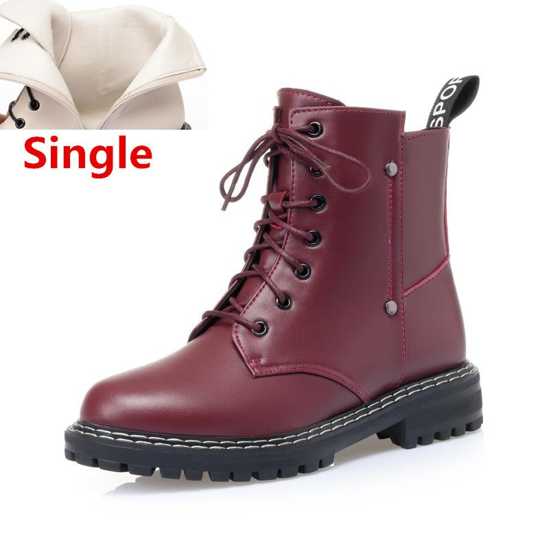 Genuine leather burgundy snow ankle boots for women with classic combat style and sturdy rubber sole.