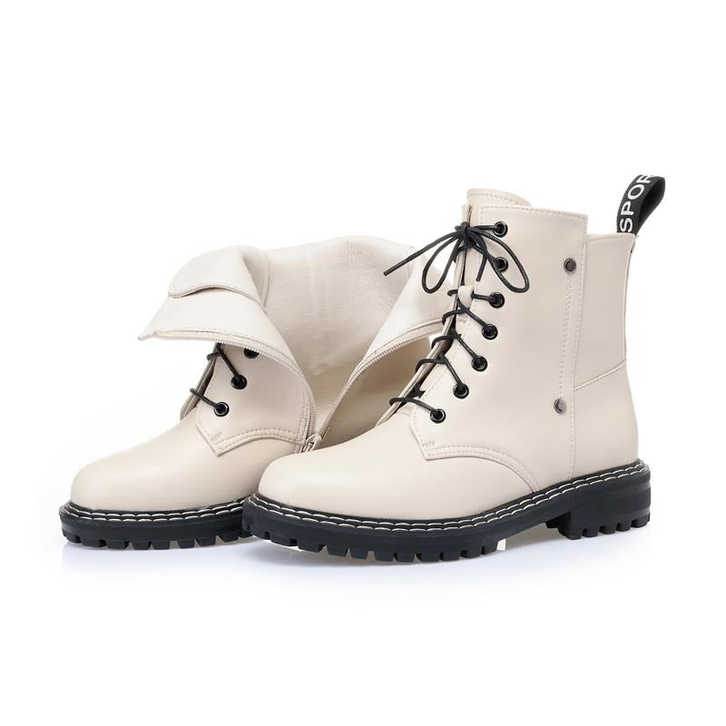 Stylish beige genuine leather snow ankle boots with black rubber soles, perfect for autumn and winter fashion.