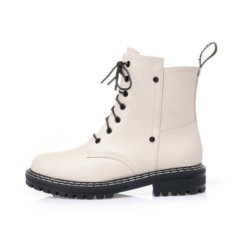 Stylish beige genuine leather snow ankle boots for women with chunky black sole and lace-up design.