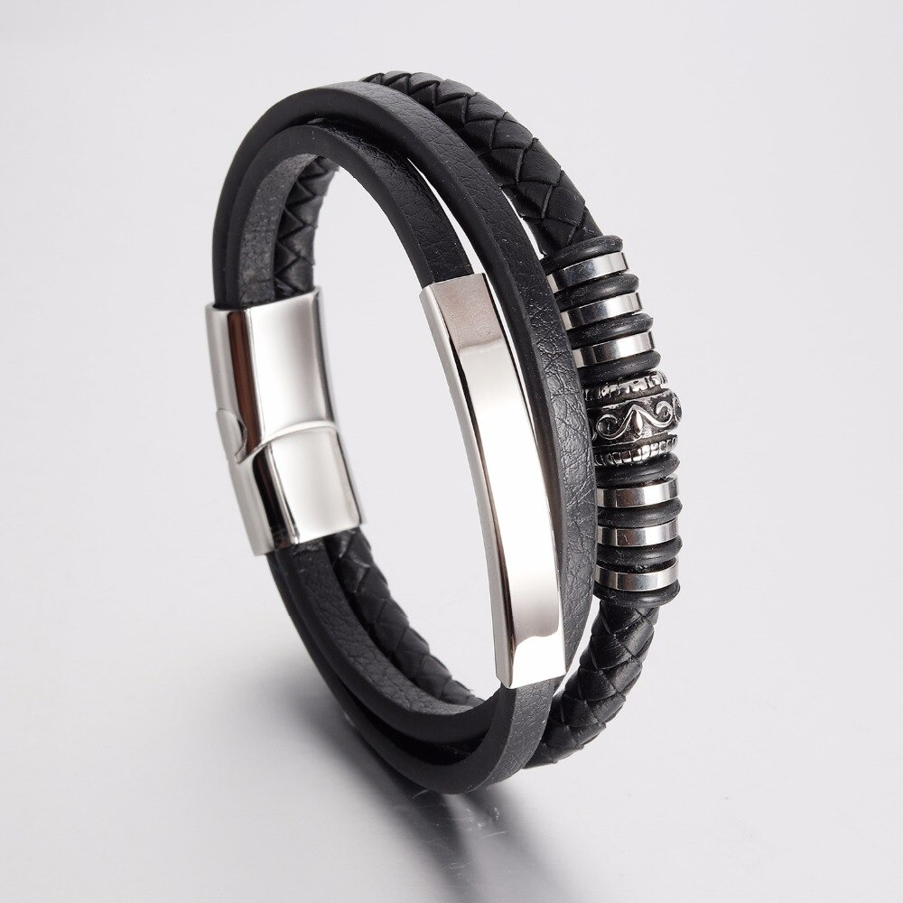 Stylish genuine leather and stainless steel bracelet with black magnetic clasp, perfect for classic or rock outfits.