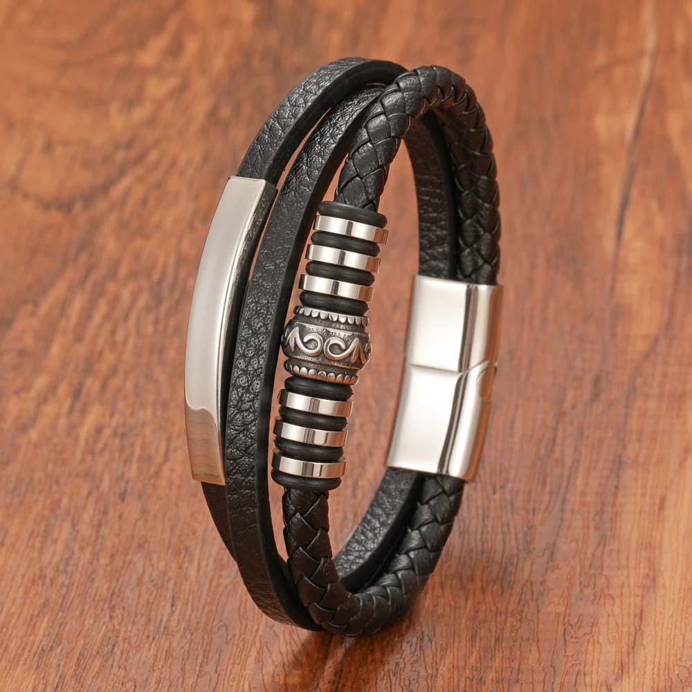 Genuine leather stainless steel bracelet with black magnetic clasp, stylish and versatile accessory for men.