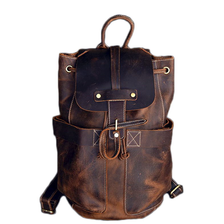 Genuine leather travel backpack in rock style with straps and pockets, ideal for goth outfits.