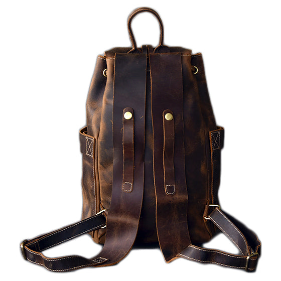 Genuine leather backpack with rock-style straps and pockets, perfect for goth and rock fashion enthusiasts.