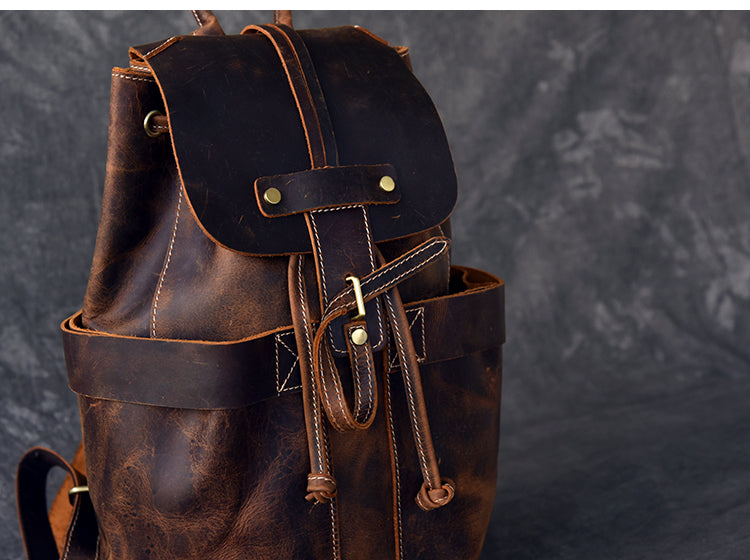 Genuine leather travel backpack with rock-style detailing and canvas accents, perfect for goth and rock outfits.