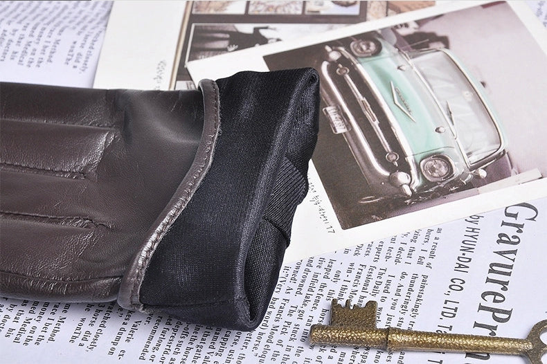 Genuine leather women's gloves in brown, featuring a stylish wrist design, perfect for festivals or drives.