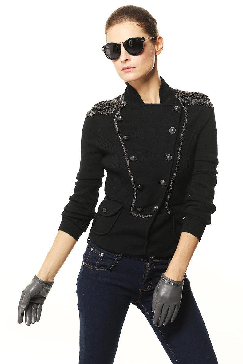 Stylish model wearing genuine leather gloves and a chic black jacket, accessorized with sunglasses for a trendy look.