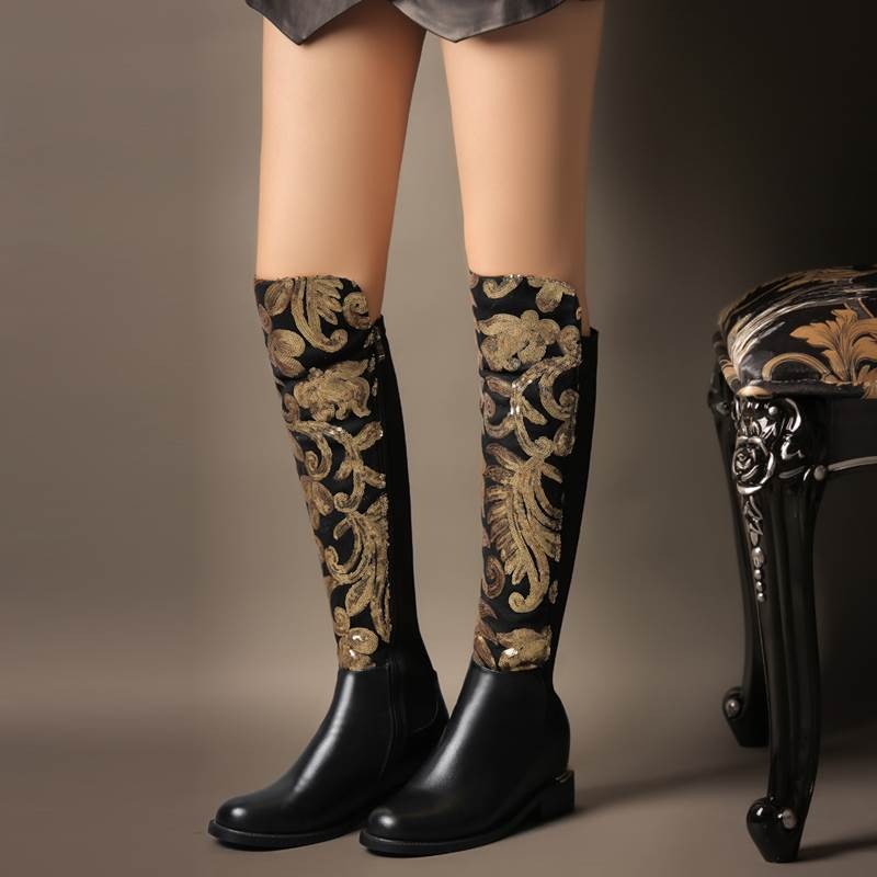 Black genuine leather knee-high boots with golden sequins, perfect for alternative fashion styles.