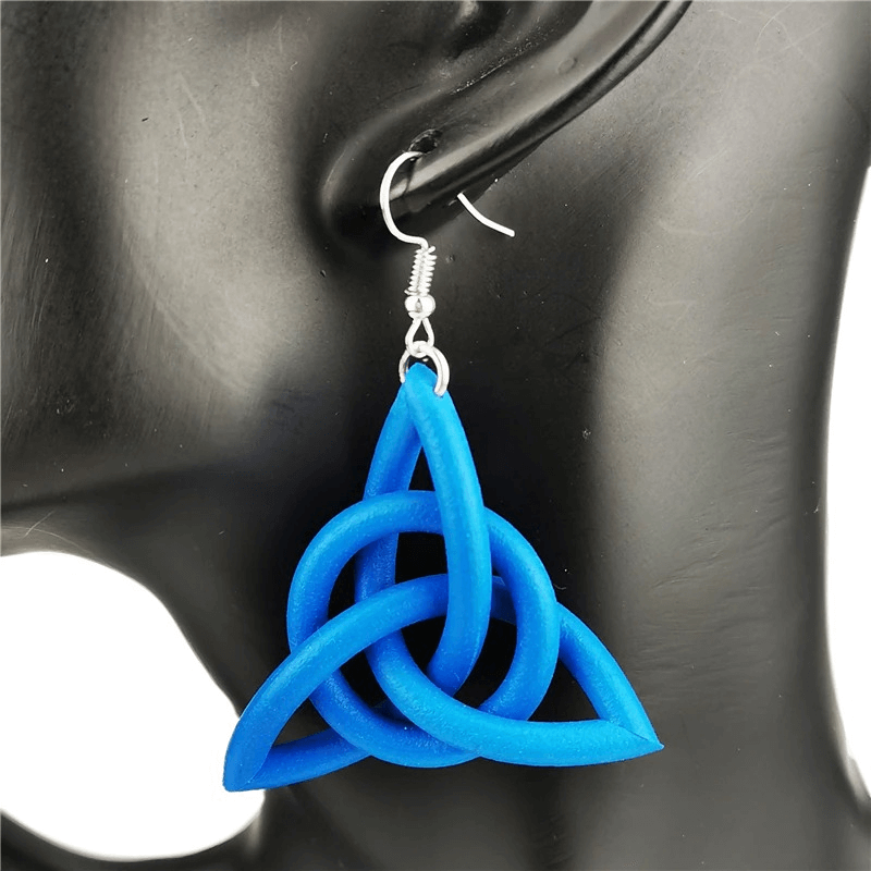 Handmade blue geometric drop earrings featuring a unique tri-knot design, perfect ethnic accessory for women.