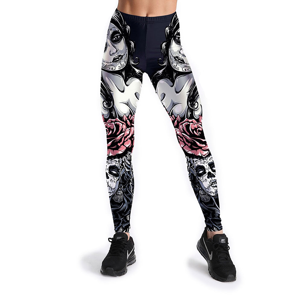 Girl in gothic style leggings featuring roses and skulls, perfect for fitness and edgy fashion.