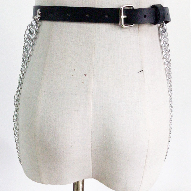 Goth leather body harness belt with chains, adjustable black waist strap for punk fashion and alternative outfits.