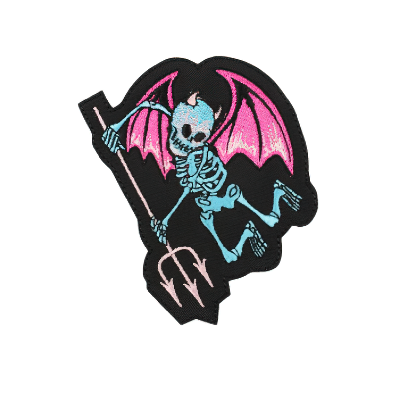 Goth skeleton patch with pink wings and forks, perfect unisex accessory for stylish clothing.