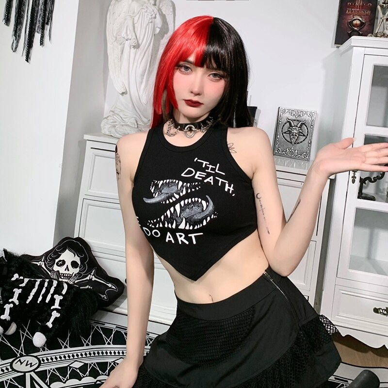 Gothic women's sleeveless cropped asymmetrical tank top with graphic print in a stylish setting.