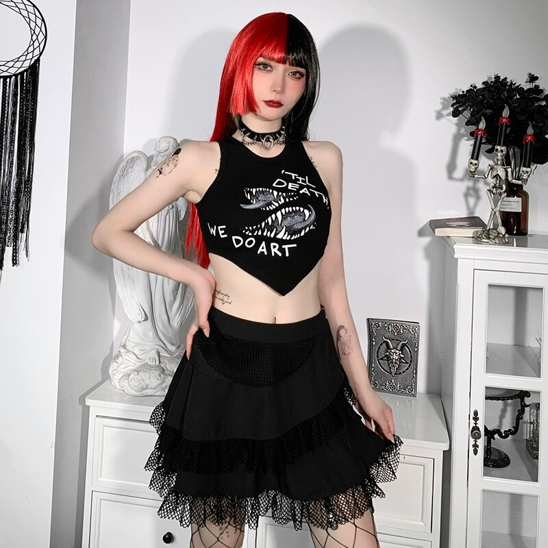 Gothic women's asymmetrical tank top featuring a bold print, model in a chic layered black skirt.