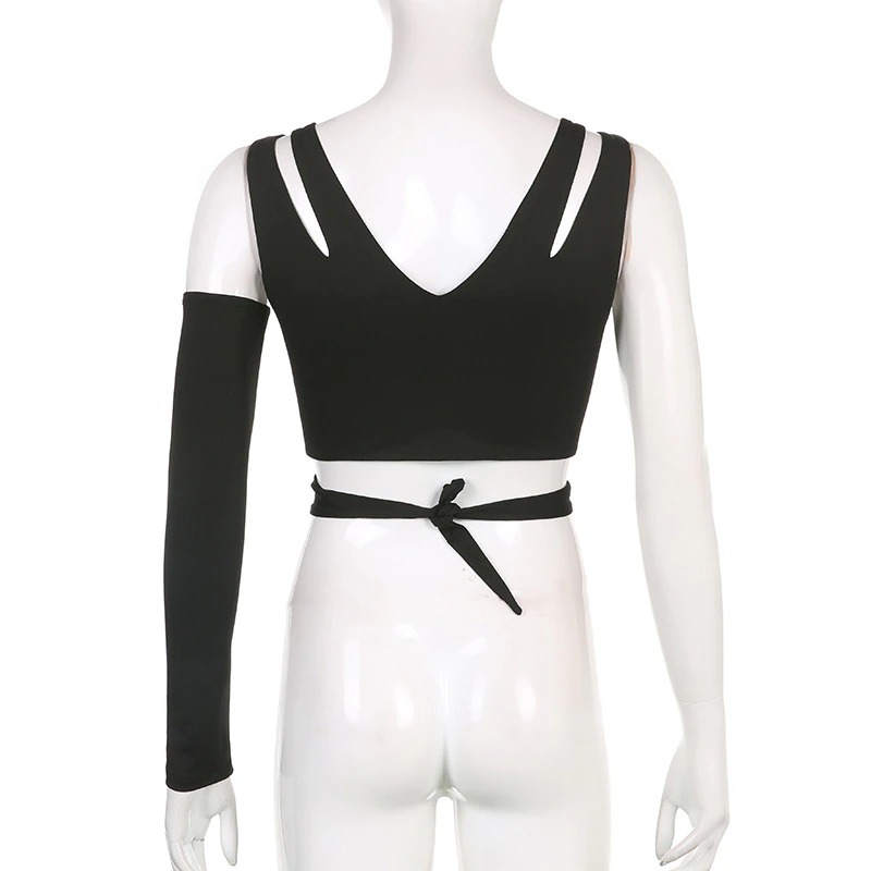 Back view of a black gothic crop top with cut-out design and one long sleeve, perfect for punk chic style.