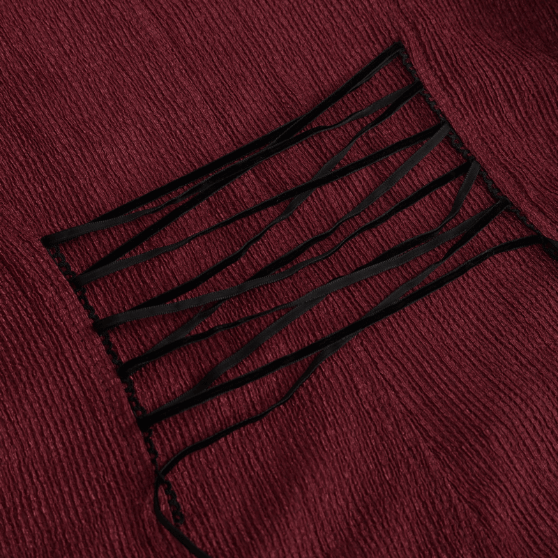 Close-up of the Gothic wine red blouse showcasing black appliqued detailing and flare sleeve design.