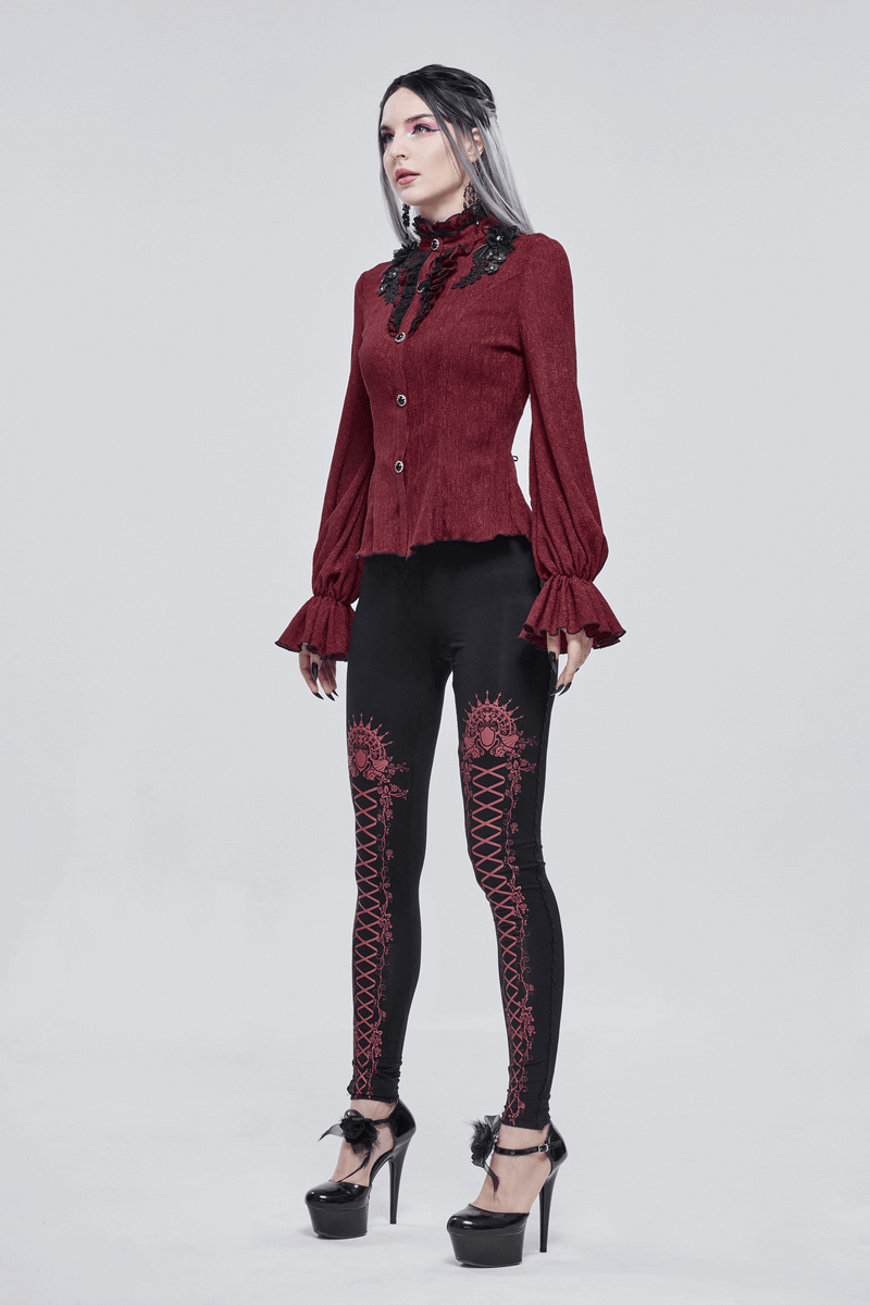 Gothic women's wine red blouse with flared sleeves and buttons, paired with stylish black leggings.