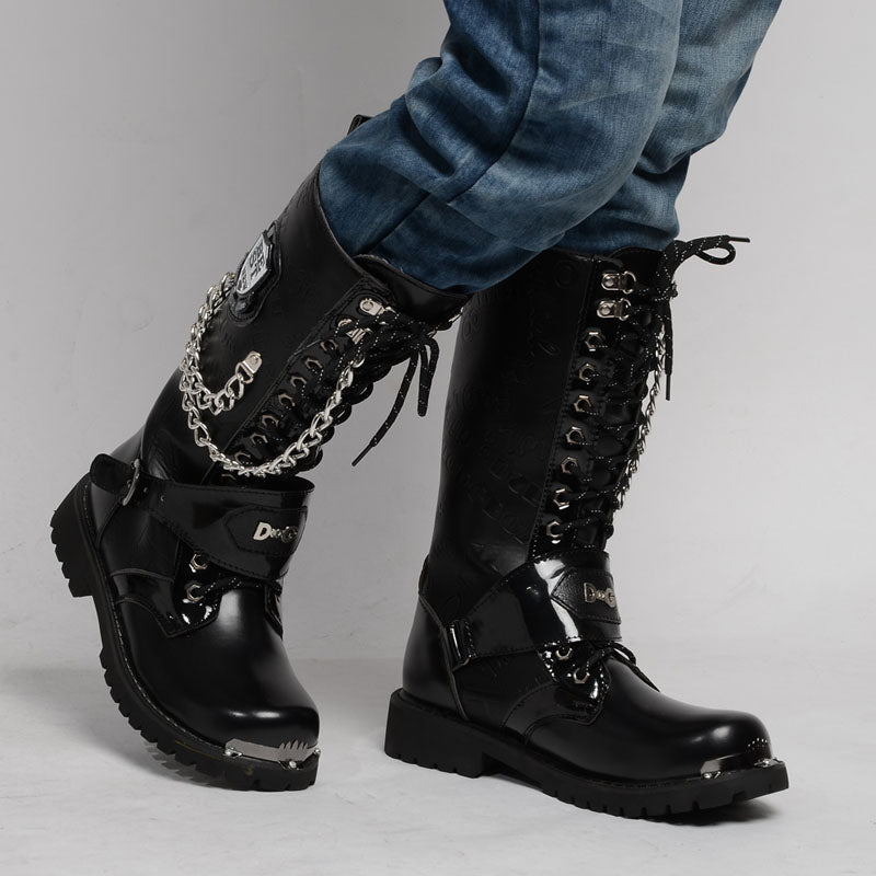 Gothic army boots with metal chain detail, perfect for rock festivals and rave outfits, showcasing punk style.