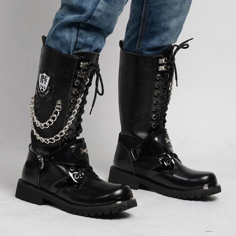 Gothic army boots with metal chains and badges, perfect for rave outfits and rock festivals.