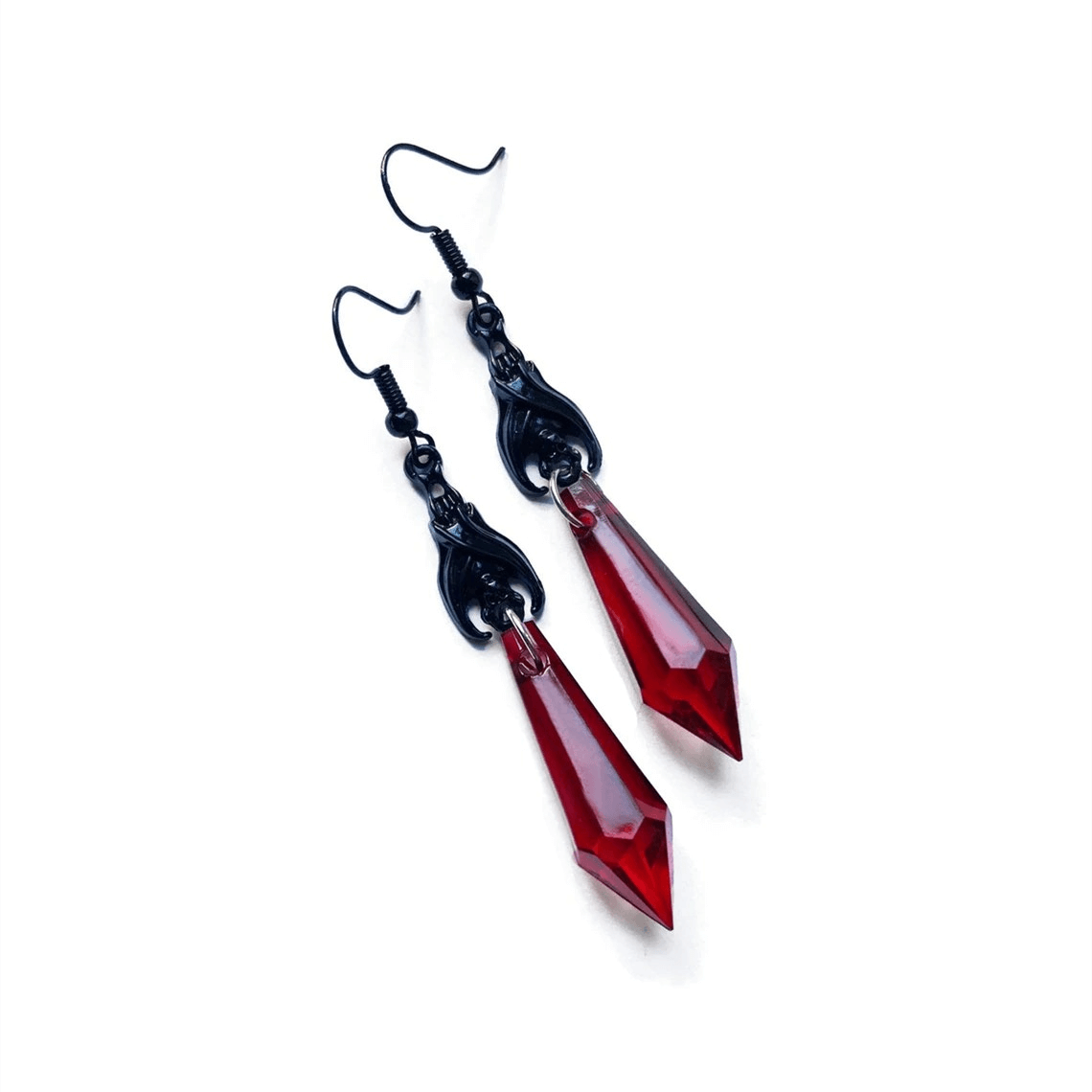 Gothic bat earrings with striking red teardrop beads for alternative fashion lovers.