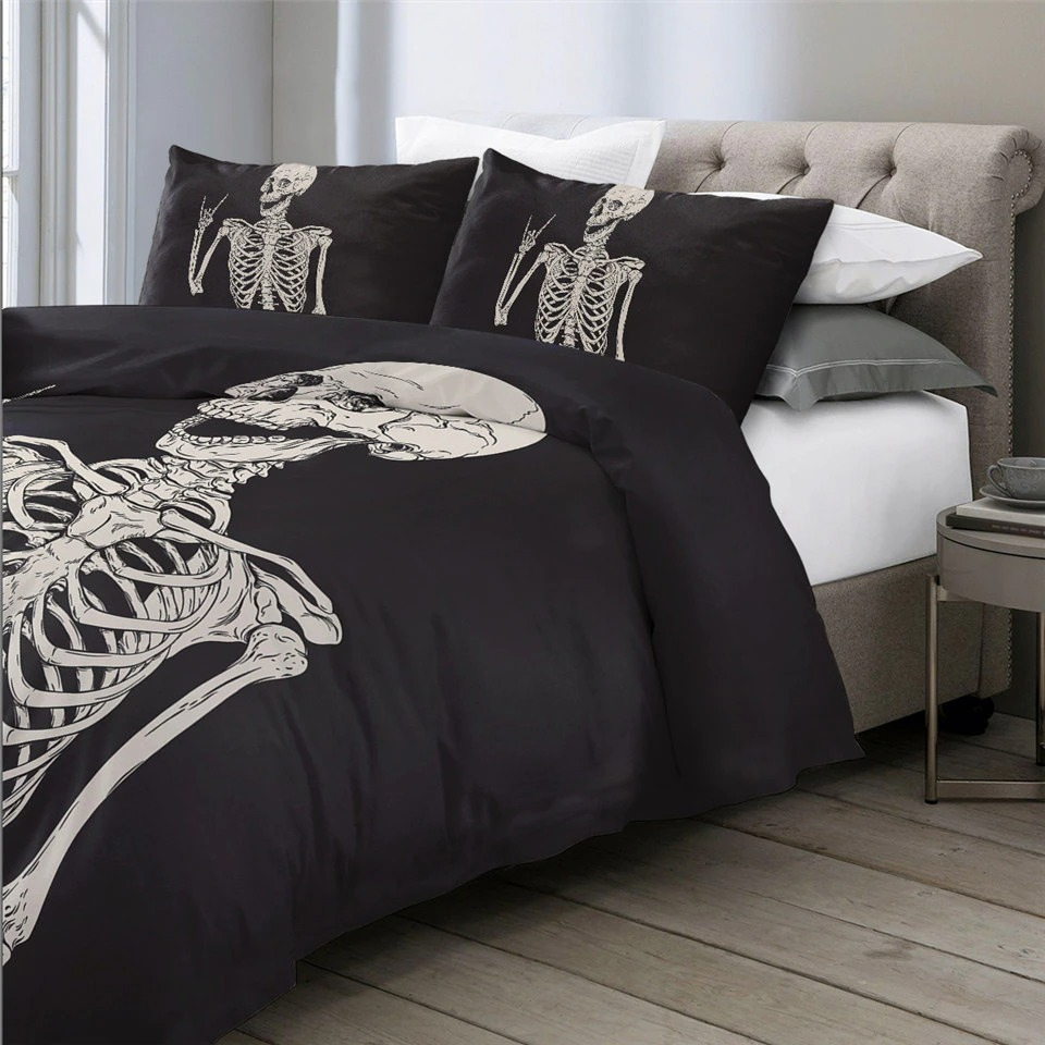 Gothic bedding set featuring skeleton design on black duvet cover and matching pillowcases in a stylish bedroom setting.